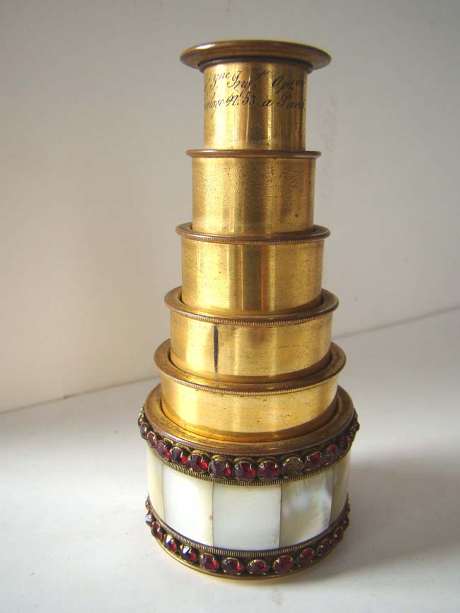 A fine French five-draw gilt brass monocular decorated with faux rubies and mother-of-pearl circa 1820